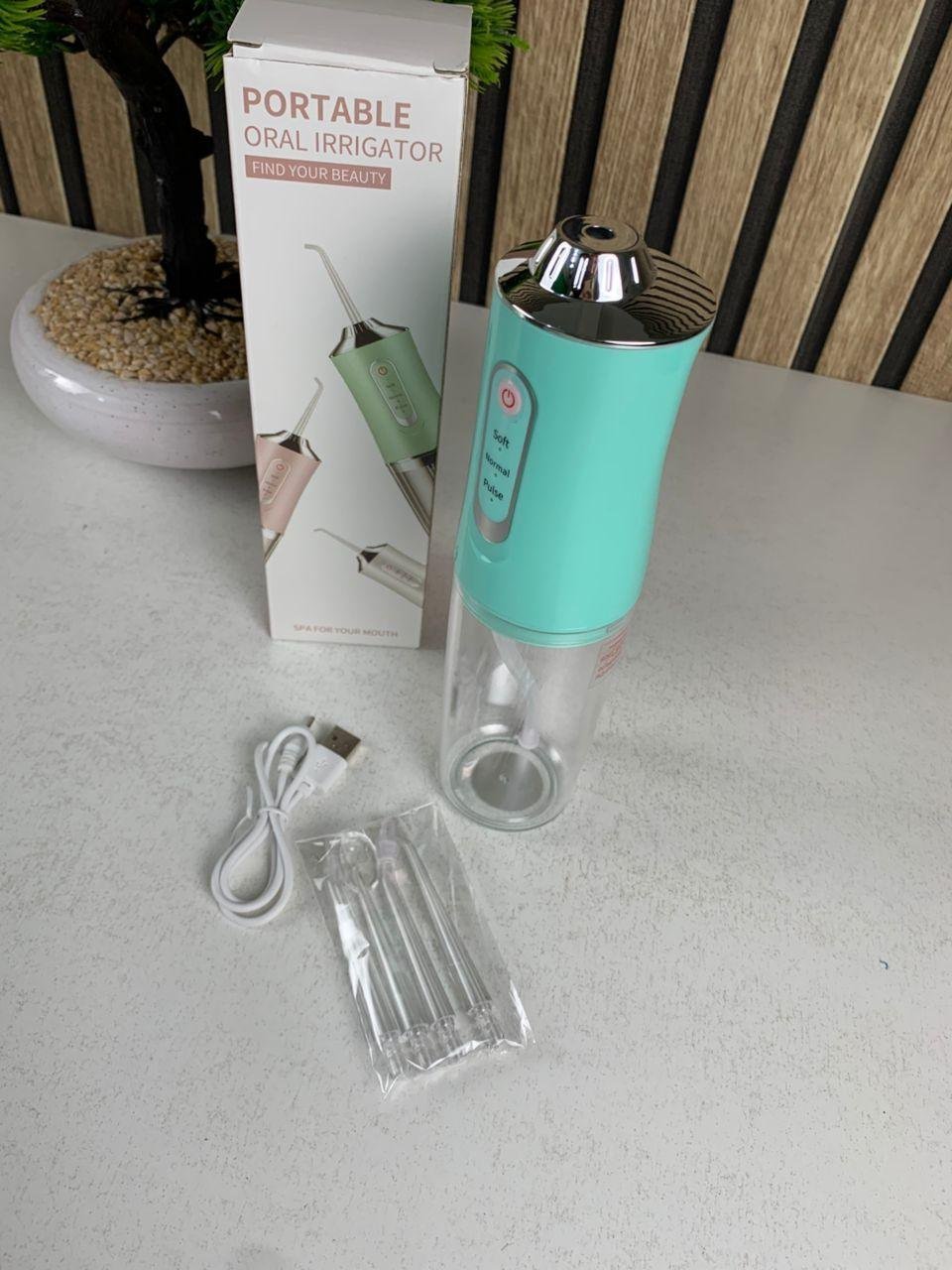Hydropulseur dentaire électrique sans fil Rechargeable par USB – جهاز تنظيف الأسنان - الصورة 3