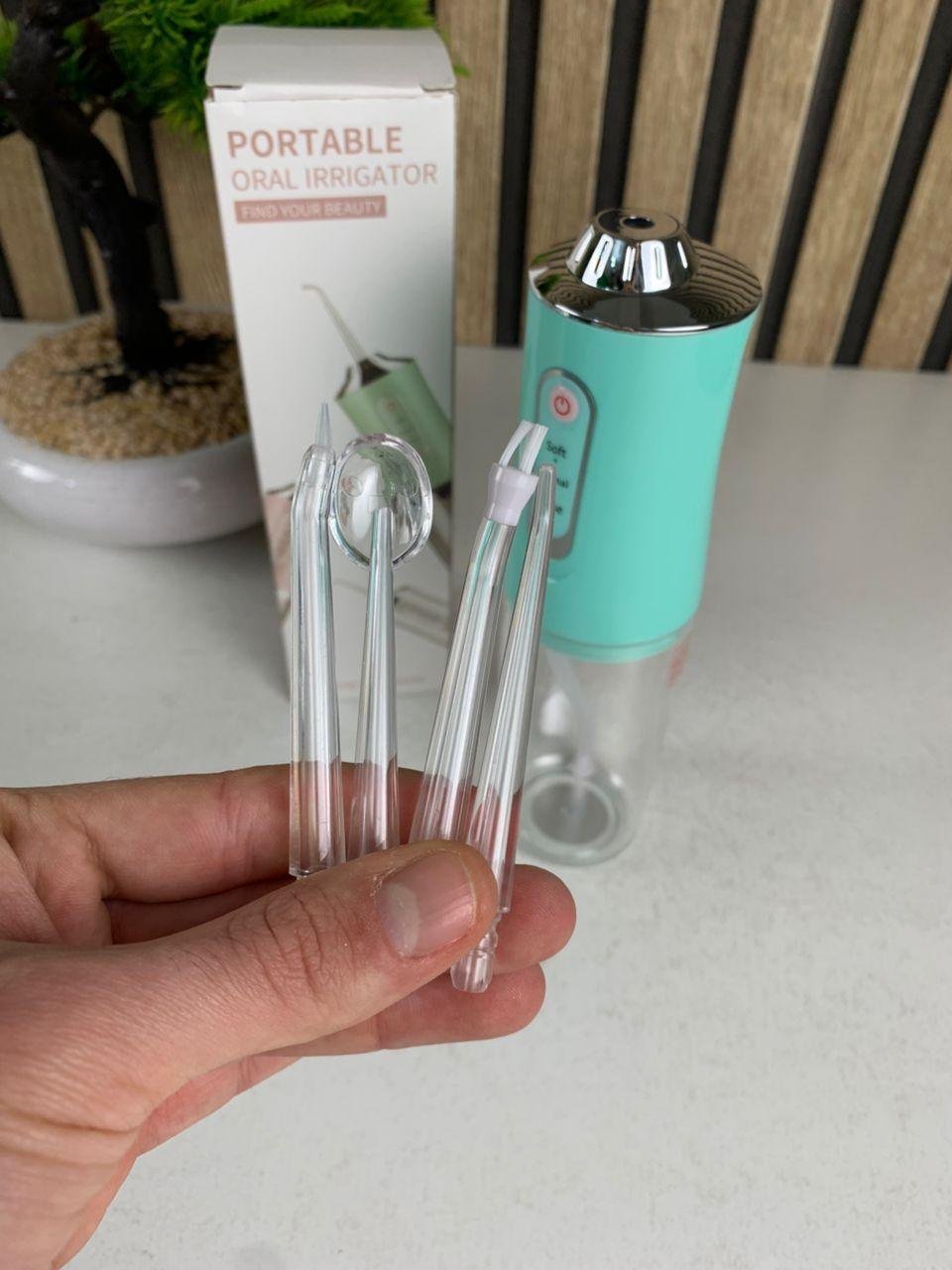 Hydropulseur dentaire électrique sans fil Rechargeable par USB – جهاز تنظيف الأسنان - الصورة 2