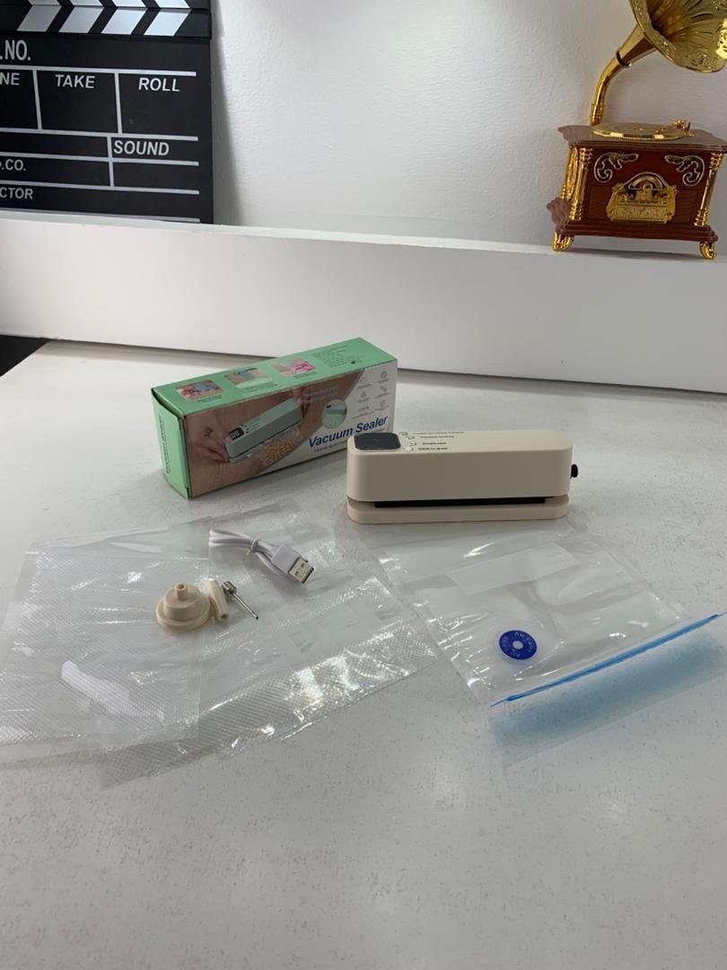 Mini scelleuse sous vide et Extracteur d’air portable 60 kPa avec 3 niveaux de température – جهاز تفريغ الهواء وغلق الأكياس - الصورة 4