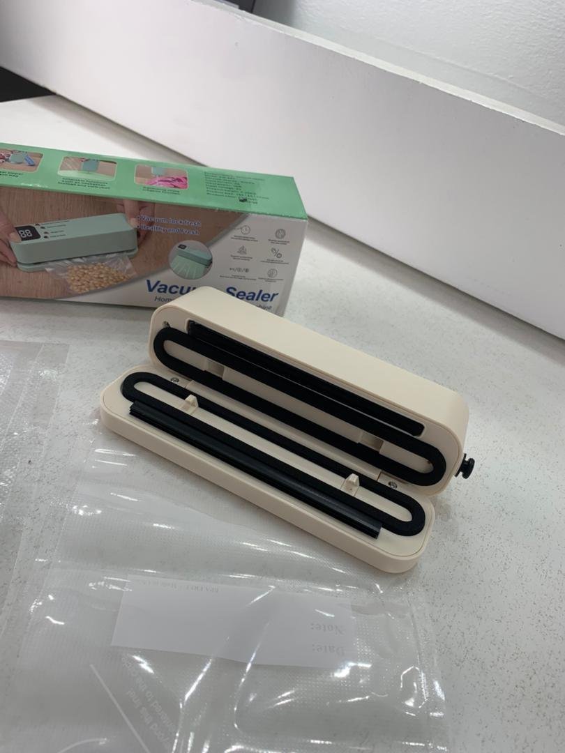 Mini scelleuse sous vide et Extracteur d’air portable 60 kPa avec 3 niveaux de température – جهاز تفريغ الهواء وغلق الأكياس - الصورة 2